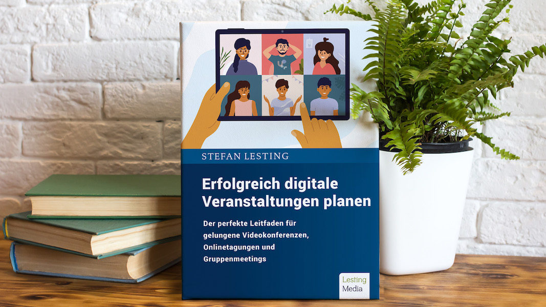 Buch digitale Veranstaltung auf Schreibtisch